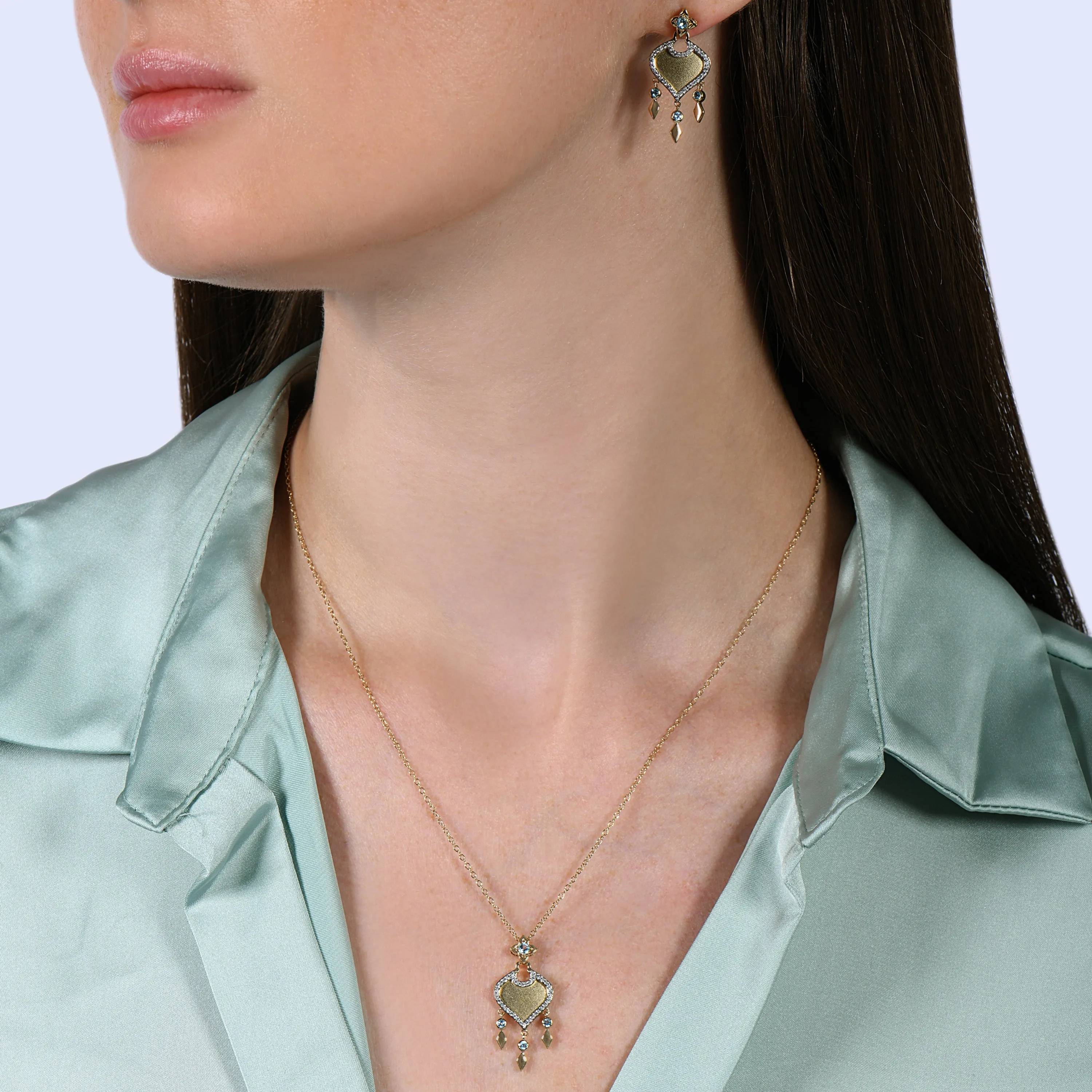 Enchanted Disney Fine Jewelry 10K Yellow Gold 1/5 Cttw Diamond and Swiss Blue Topaz Jasmine Earrings