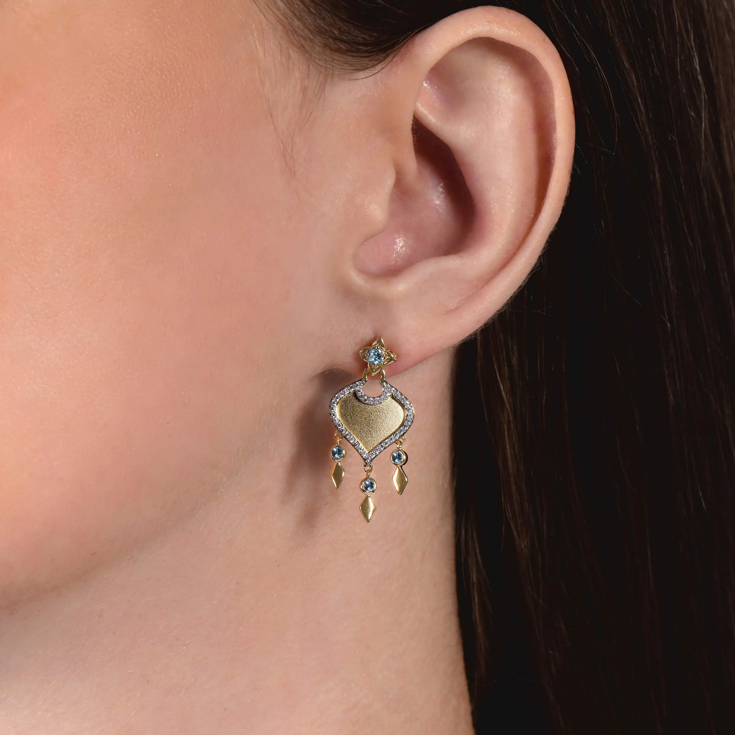 Enchanted Disney Fine Jewelry 10K Yellow Gold 1/5 Cttw Diamond and Swiss Blue Topaz Jasmine Earrings