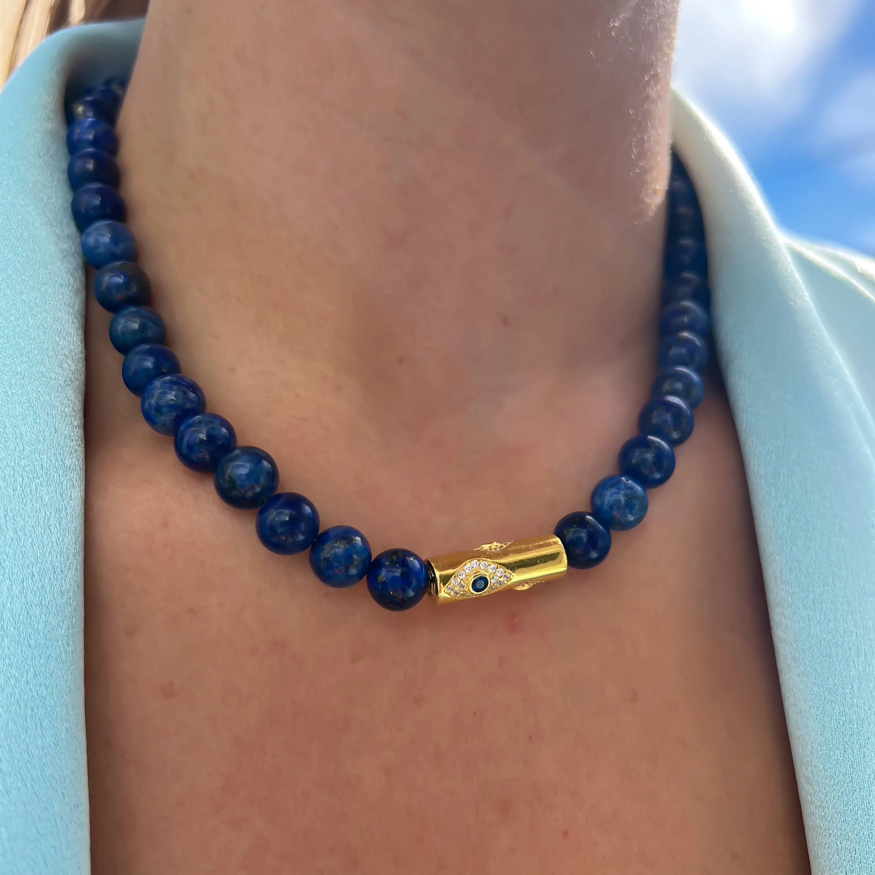 Lapis beaded gold rod eye necklace