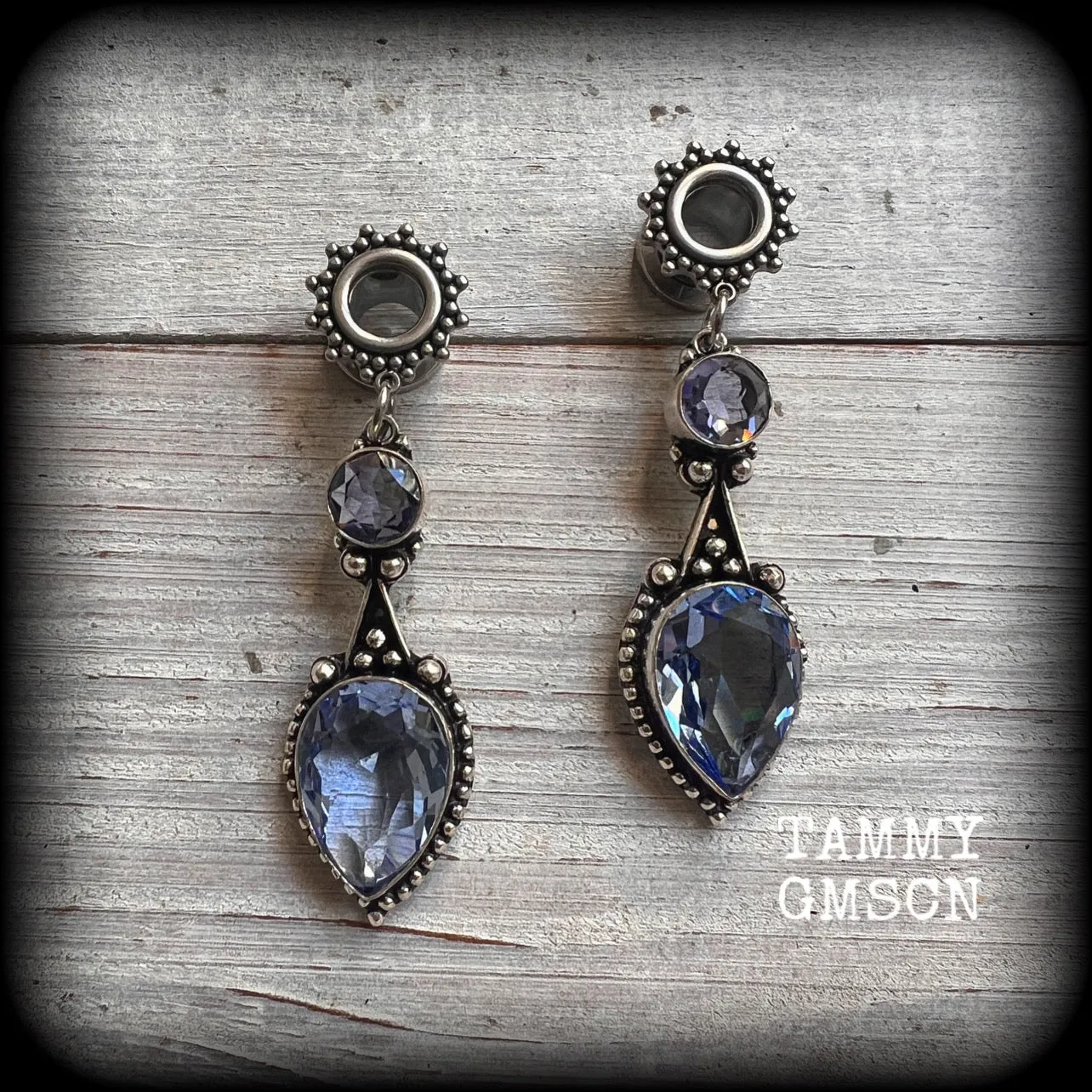 Ornate gemstone tunnel earrings-Blue topaz tunnel dangles