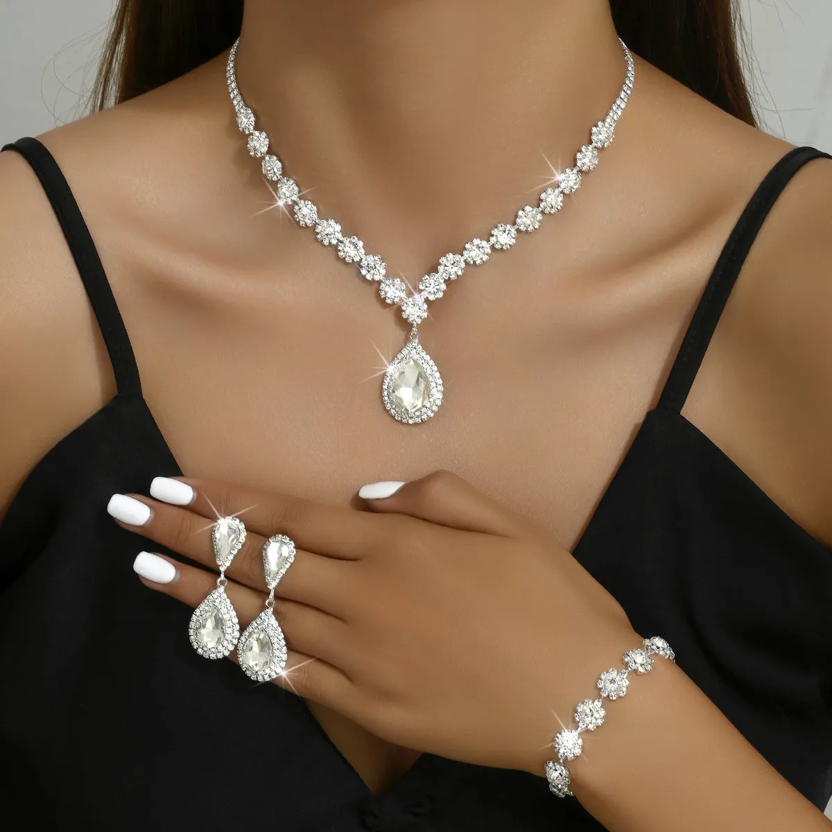 SereneSparkle Three-Piece Set - Fashion Jewelry, Necklace, Ear Stud, Bracelet